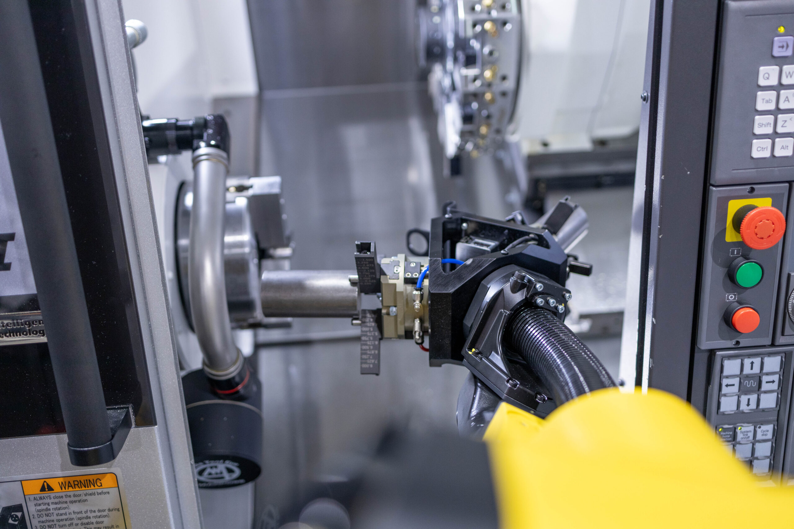 Load-and-Go-Arm_Race-to-Automation-scaled